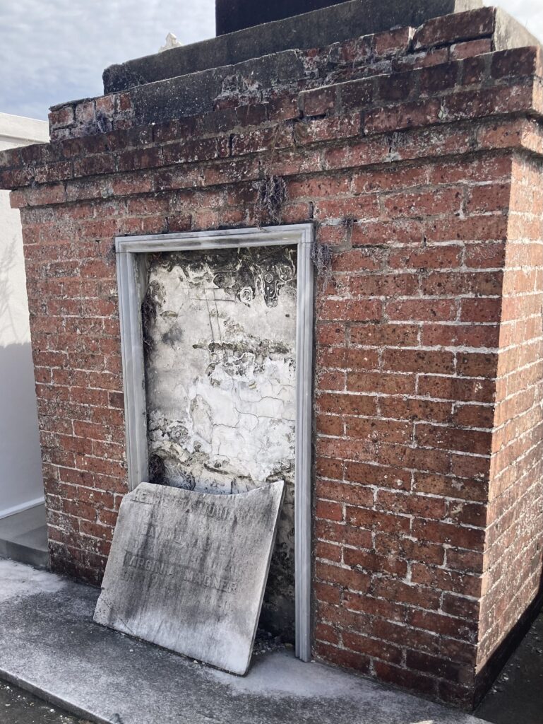 Vault with broken inscription stone at St Patrick Cemetery #2